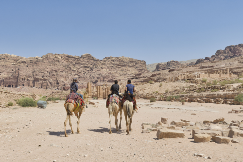 Camel riders add to the fascination of Petra, one of the Seven World Wonders