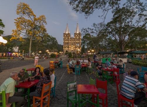 Locals enjoy a summer evening in Jardin, a small town near Medellin